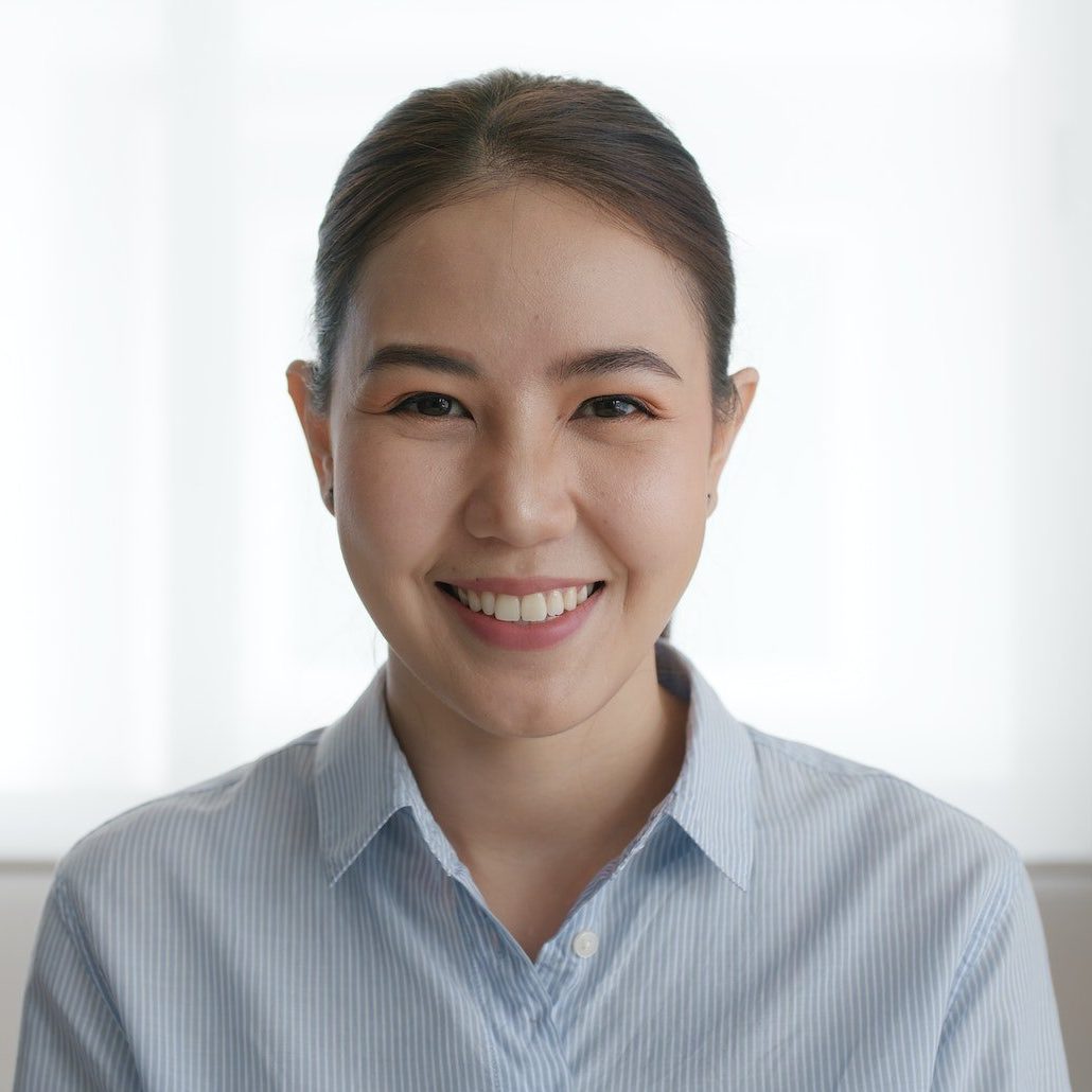 Asia people happy face woman relax toothy smile look at home